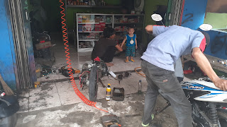 Bengkel evi motor