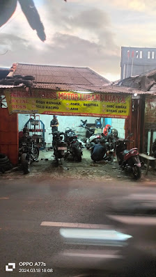 Bengkel Press Motor Lubang Buaya