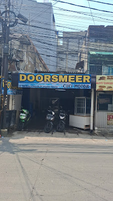Doorsmeer cuci motor