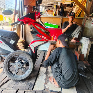Garasi shock breaker motor