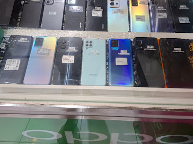 Putra Cell Service HP, Pulsa, Accesoris DLL