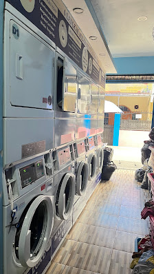 Ruang Nyuci Laundry Coin Express