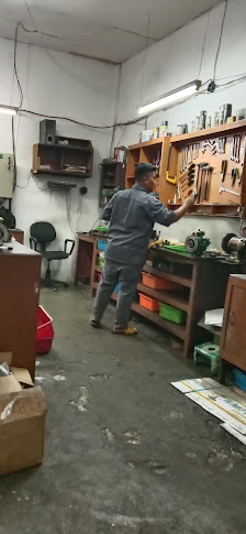 Service Mesin Genset